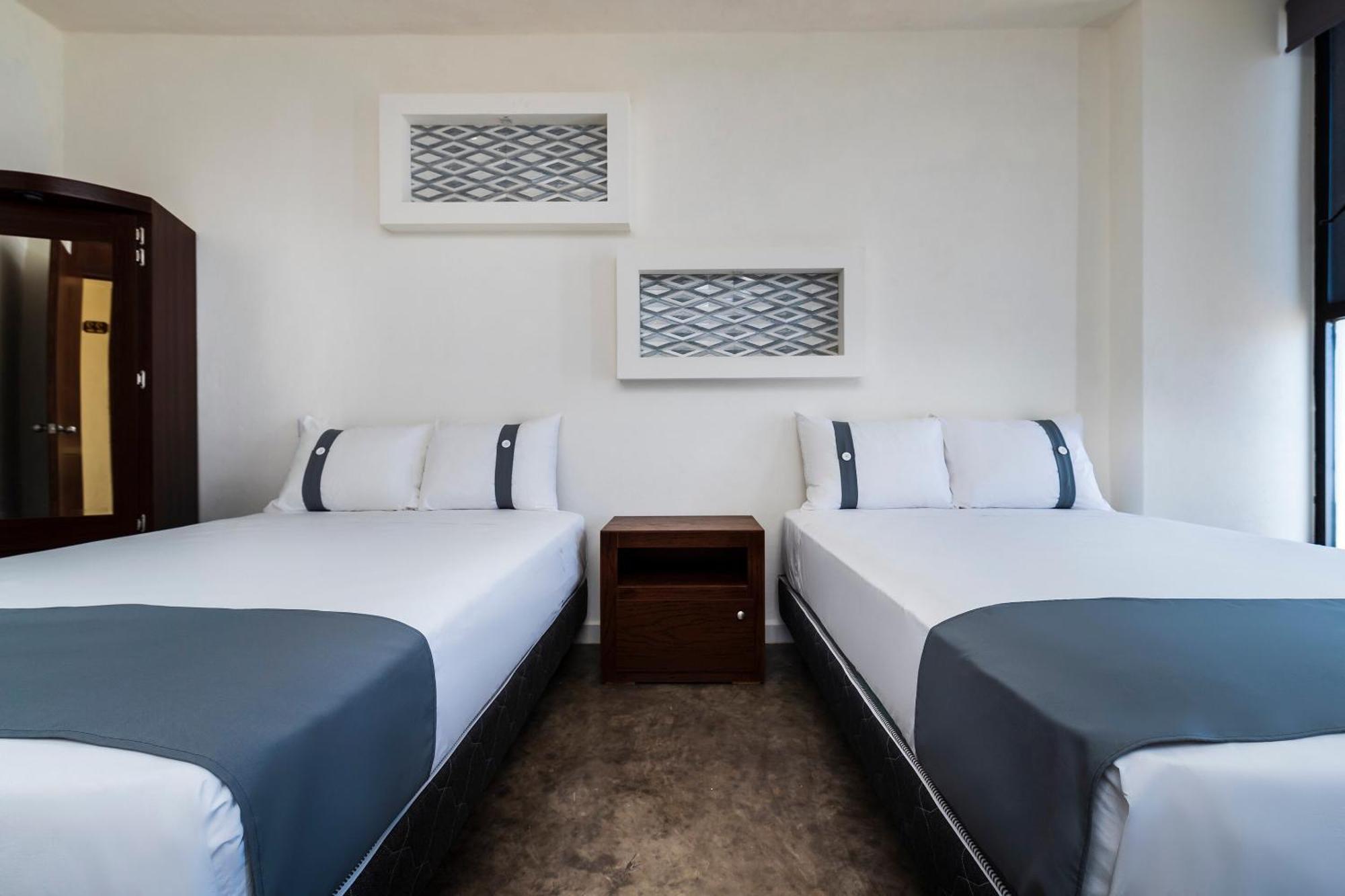 Capital O Hotel Joyma Suites, San Luis San Luis Potosí Buitenkant foto